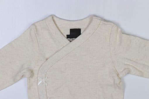 بادی آستین بلند برند H&M طرح کبریتی شیری - Image 2