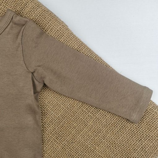 بادی آستین بلند H&M طرح قهوه ای کم رنگ چپ و راستی - Image 2