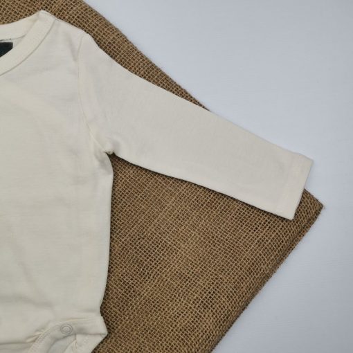 بادی آستین بلند H & M طرح کرمی ساده چپ و راستی  0-1 ماه - Image 2