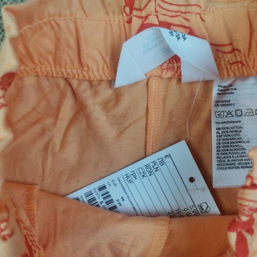 شلوارک h&m طرح یونیکورن نارنجی جیب دار