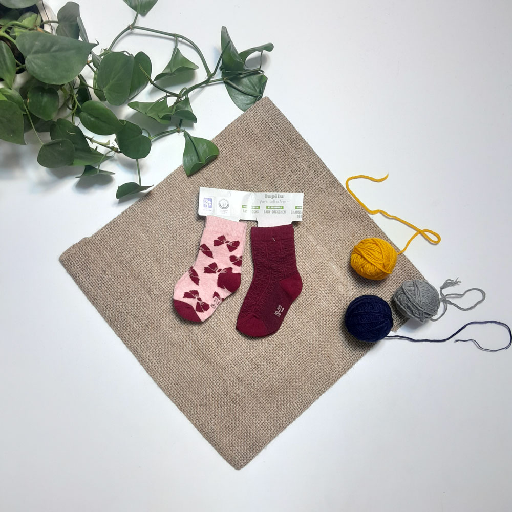 جوراب نوزادی دخترانه آستین کوتاه برند lupilu طرح پاپیون دار ست دو عددی سرخابی رنگ - 12-24 ماه