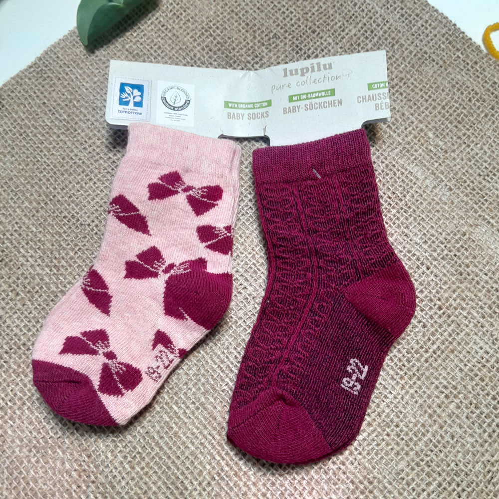 جوراب نوزادی دخترانه آستین کوتاه برند lupilu طرح پاپیون دار ست دو عددی سرخابی رنگ - 12-24 ماه
