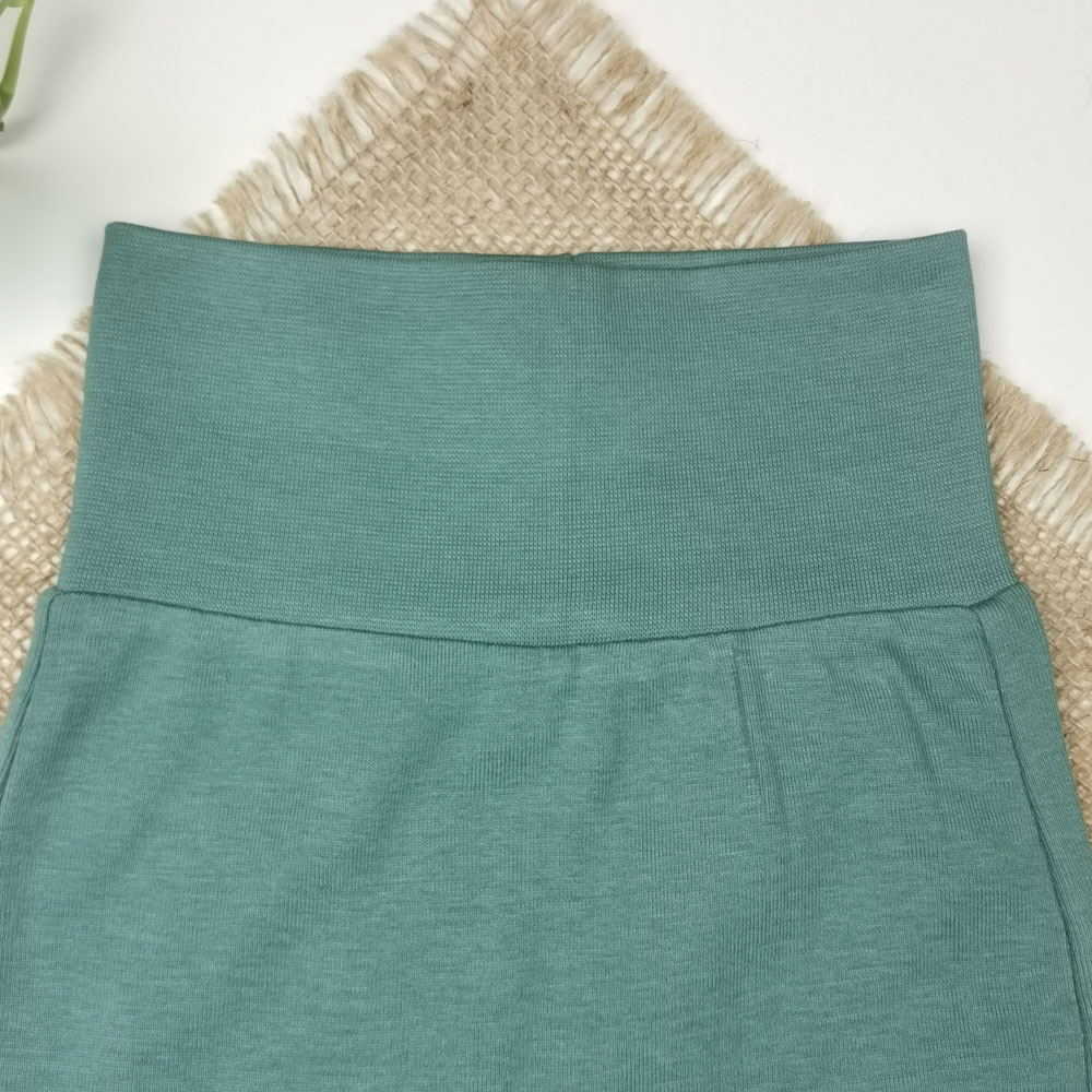 شلوار نوزادی اسلش برند h and m کمرکش سبز تیره رنگ - 2 تا 4 ماه