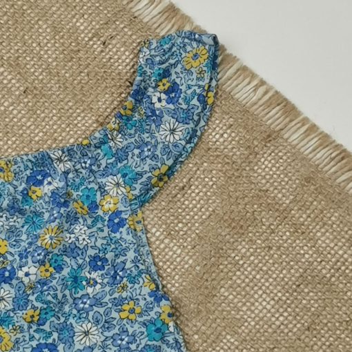 بادی نوزادی دخترانه آستین تاپ طرح چین دار گل دار آبی رنگ