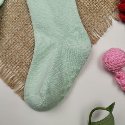 جوراب شلواری نوزادی برند impidimpi توکرکی استوپ دار سبز صابونی رنگ