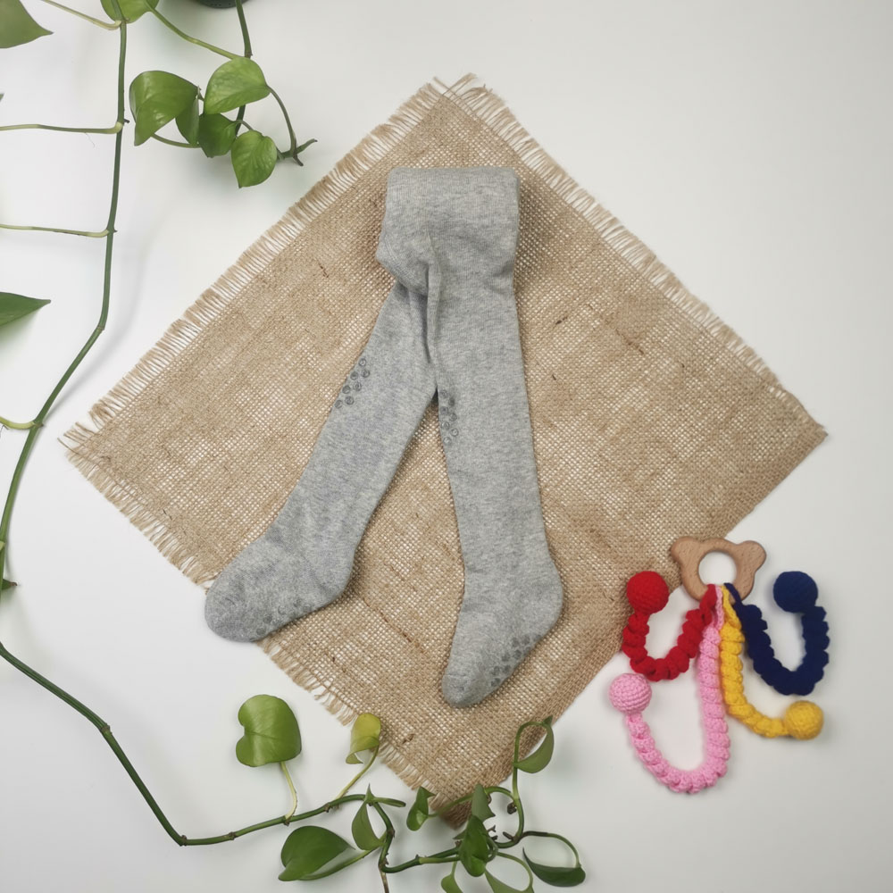 جوراب شلواری نوزادی برند impidimpi استوپ دار نیمه توکرکی طوسی کمرنگ