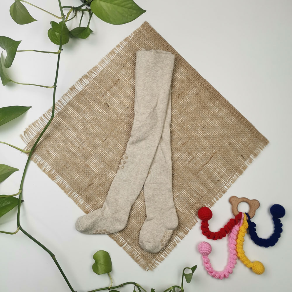 جوراب شلواری نوزادی برند impidimpi استوپ دار نیمه توکرکی نخودی رنگ - 12 تا 24 ماه