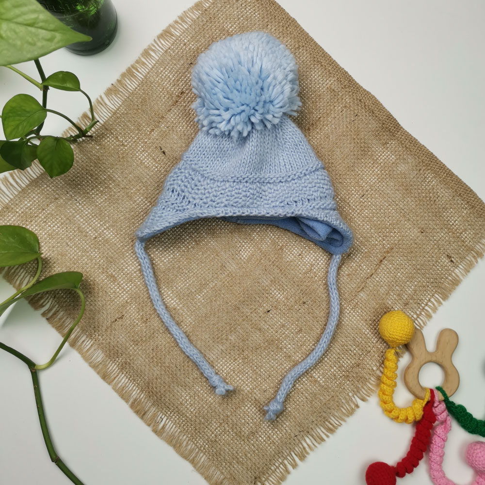 کلاه بافت نوزادی طرح توپکی آستردار فوتر ابی یخی رنگ  - 0 تا 3 ماه
