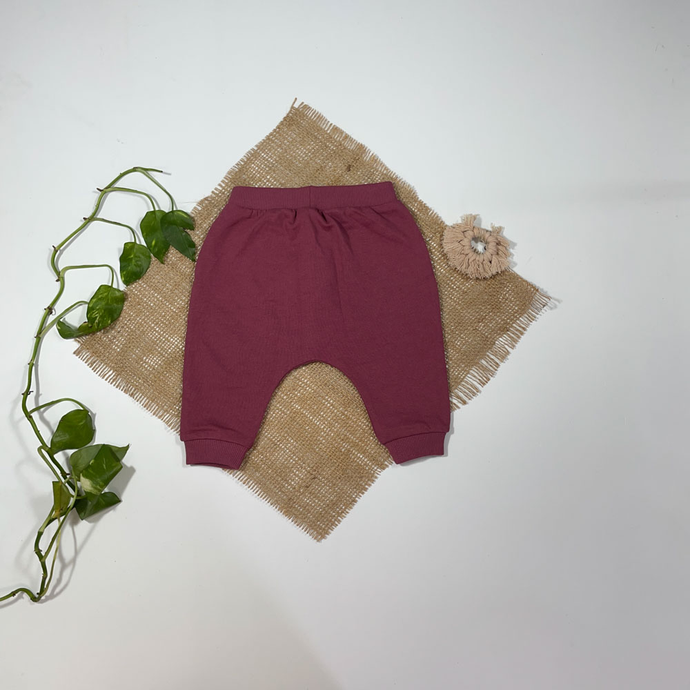 شلوار نوزادی دخترانه لبه کشتی برند Next baby طرح ساده کالباسی رنگ - 3 ماه