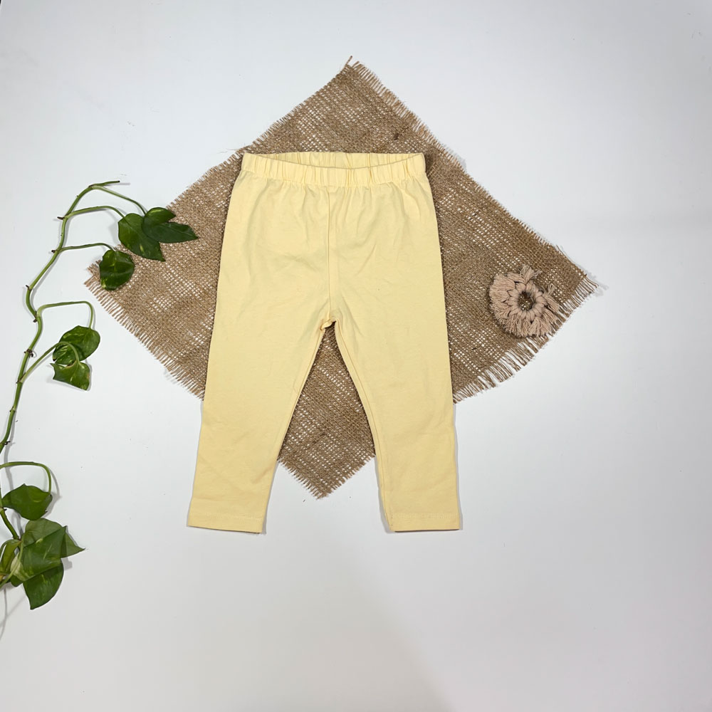 شلوار نوزادی دخترانه راسته برند TU طرح ساده زرد لیمویی رنگ - 12 ماه