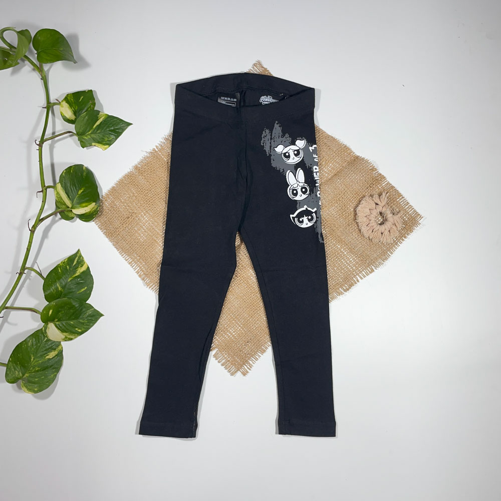 شلوار دخترانه راسته طرح عروسکی مشکی رنگ