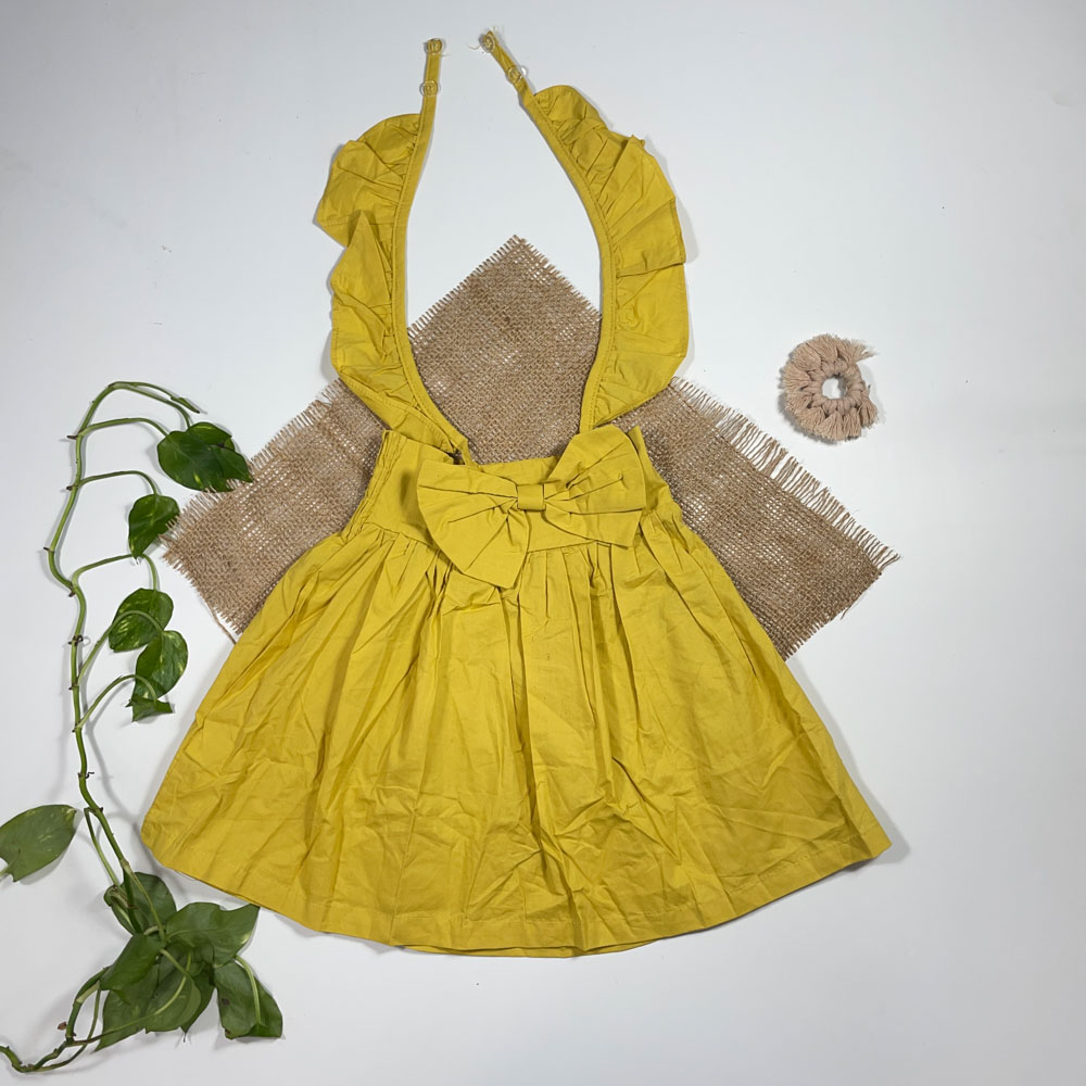 بلوز دامنی دخترانه آستین بلند طرح پاپیونی بند دار زرد رنگ - 2 تا 4 سال