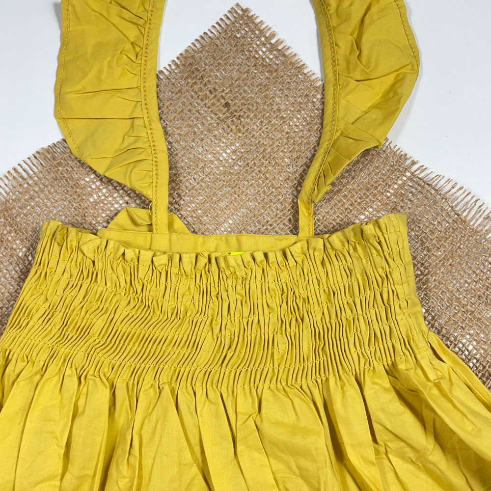 بلوز دامنی دخترانه آستین بلند طرح پاپیونی بند دار زرد رنگ - 2 تا 4 سال