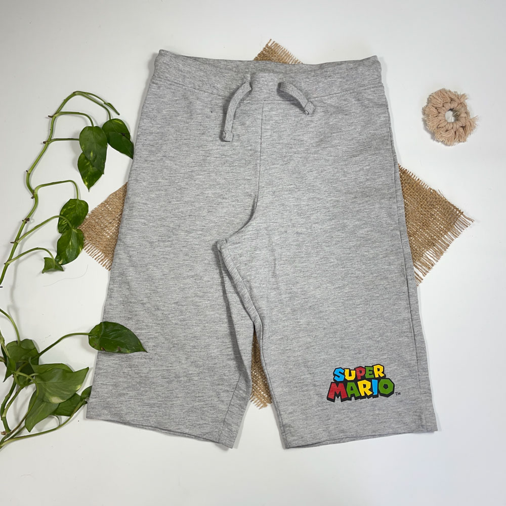 شلوارک کمر کش طوسی روشن رنگ - 8 تا 10 سال