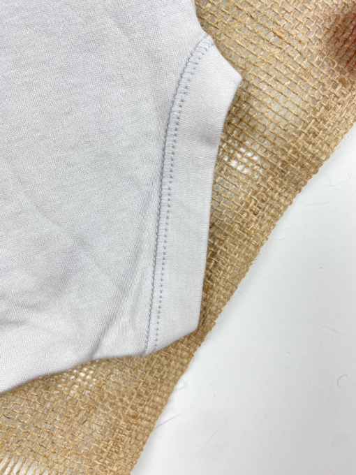 ایراد دار _ بادی نوزادی آستین کوتاه طرح ساده یقه گرد طوسی کمرنگ - 6 تا 9 ماه