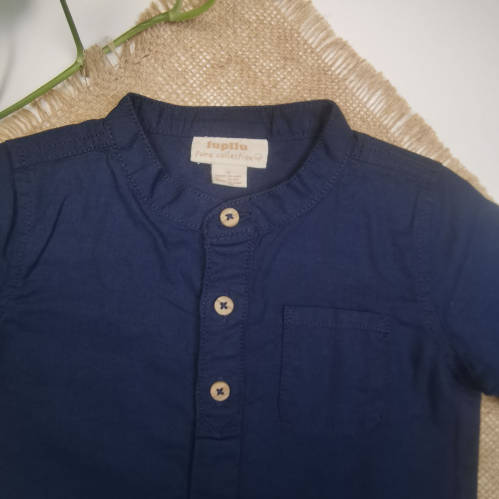 بلوز نوزادی پسرانه آستین بلند برند لوپیلو طرح دکمه ای جیب دار سرمه ای رنگ