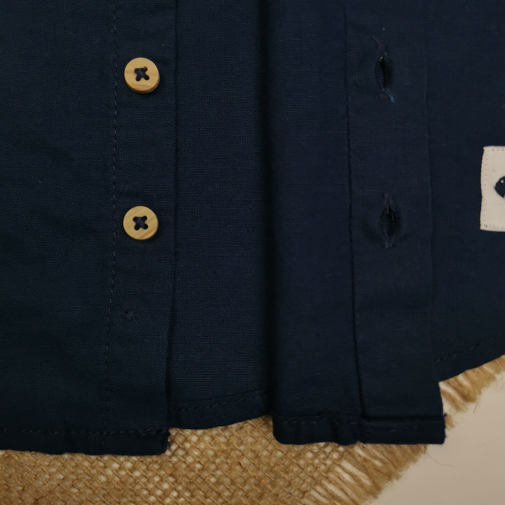 بلوز نوزادی پسرانه آستین بلند برند لوپیلو طرح دکمه ای جیب دار سرمه ای رنگ