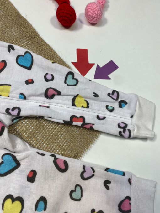 ایراد دار _ سرهمی نوزادی دخترانه آستین بلند طرح قلب قلبی بدون جوراب جلو زیپی سفید رنگ  - 0 تا 3 ماه