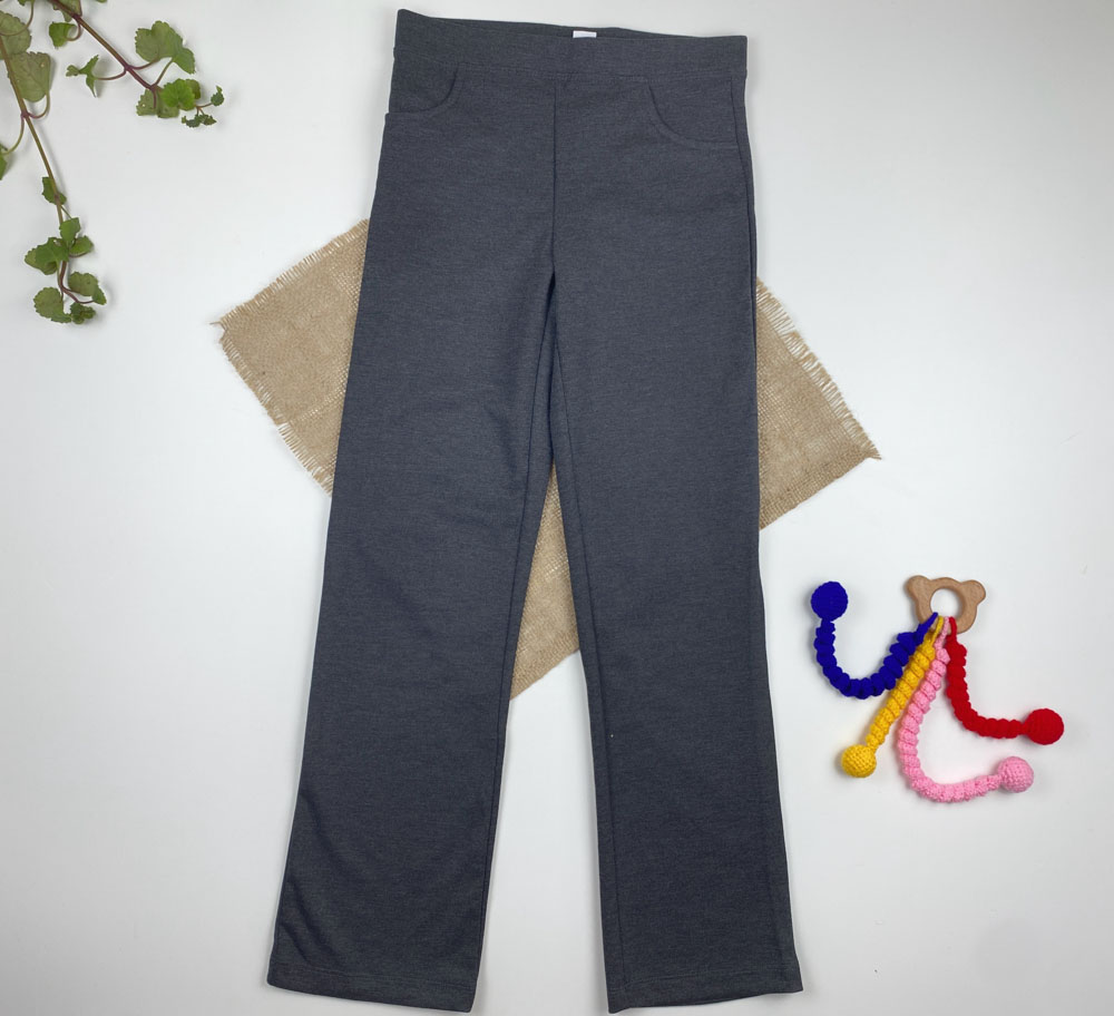 شلوار ساده طرح کمرکش ساده نوک مدادی رنگ - 9 سال