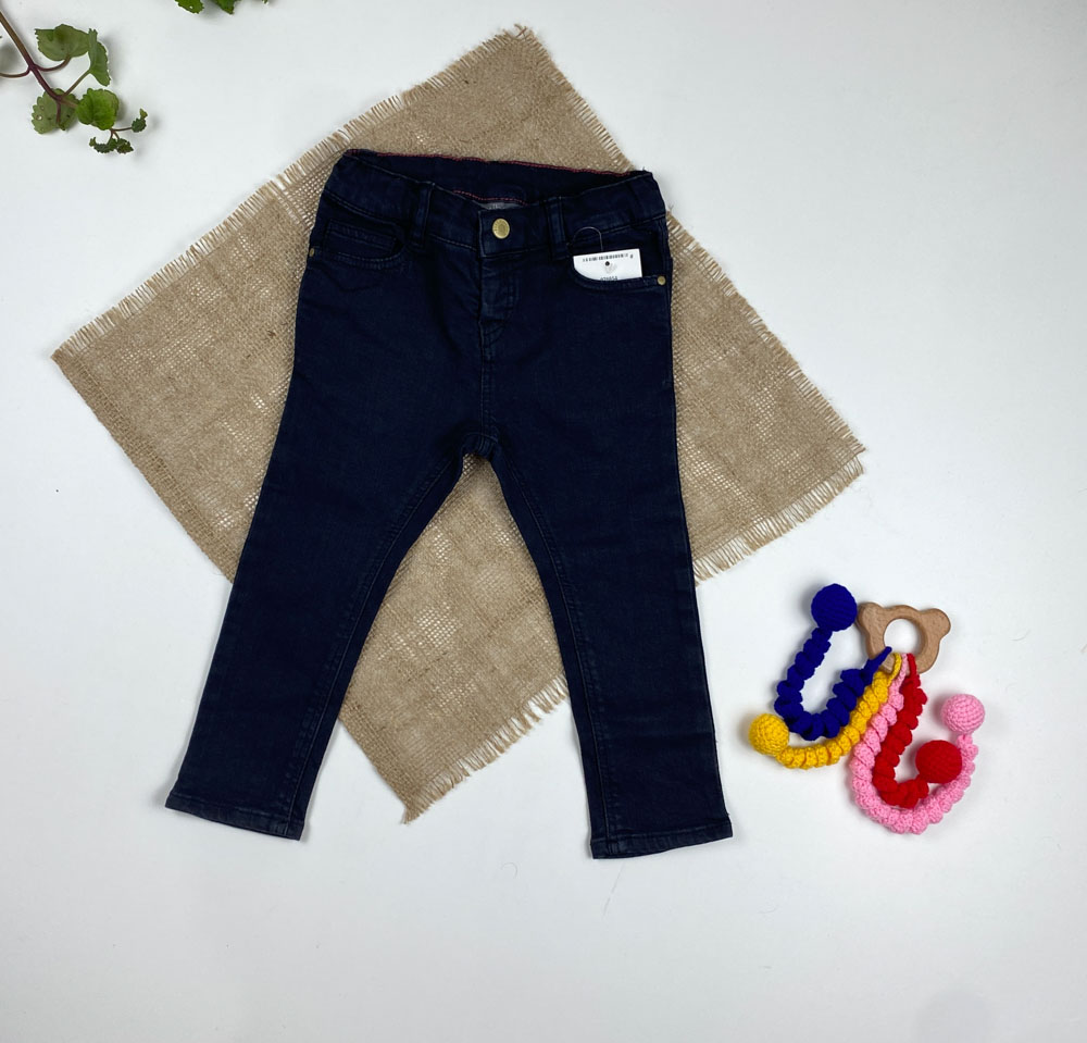 شلوار نوزادی ساده طرح کمردکمه ای زیپی جیب دار مشکی رنگ - 12 ماه