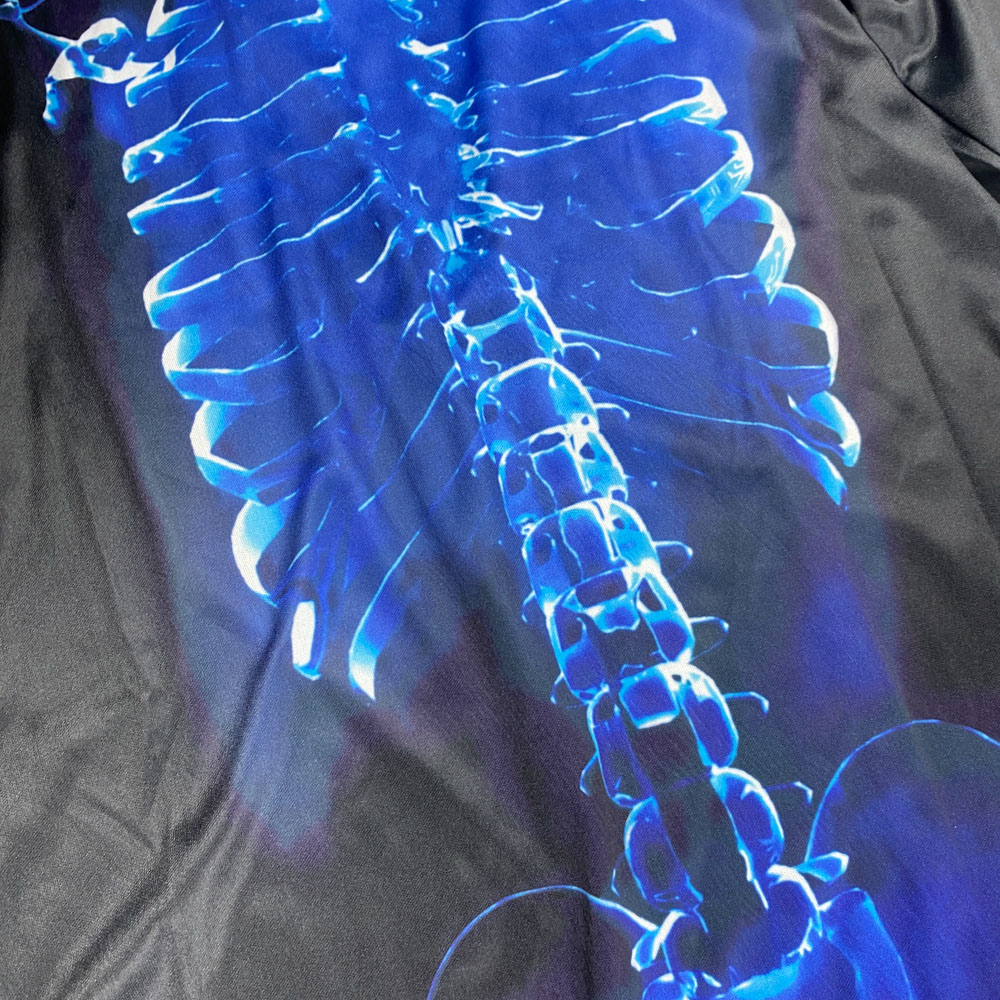 سرهمی پسرانه آستین بلند طرح اسکلت جلو بسته یقه گرد مشکی رنگ - 8 تا 10 سال