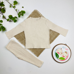 ست بلوز و شلوار نوزادی آستین بلند برند کیابی طرح کبریتی کرم رنگ