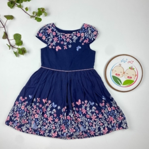 پیراهن دخترانه آستین حلقه ای طرح گل گلی یقه دلبری سرمه ای رنگ - 7 تا 8 سال