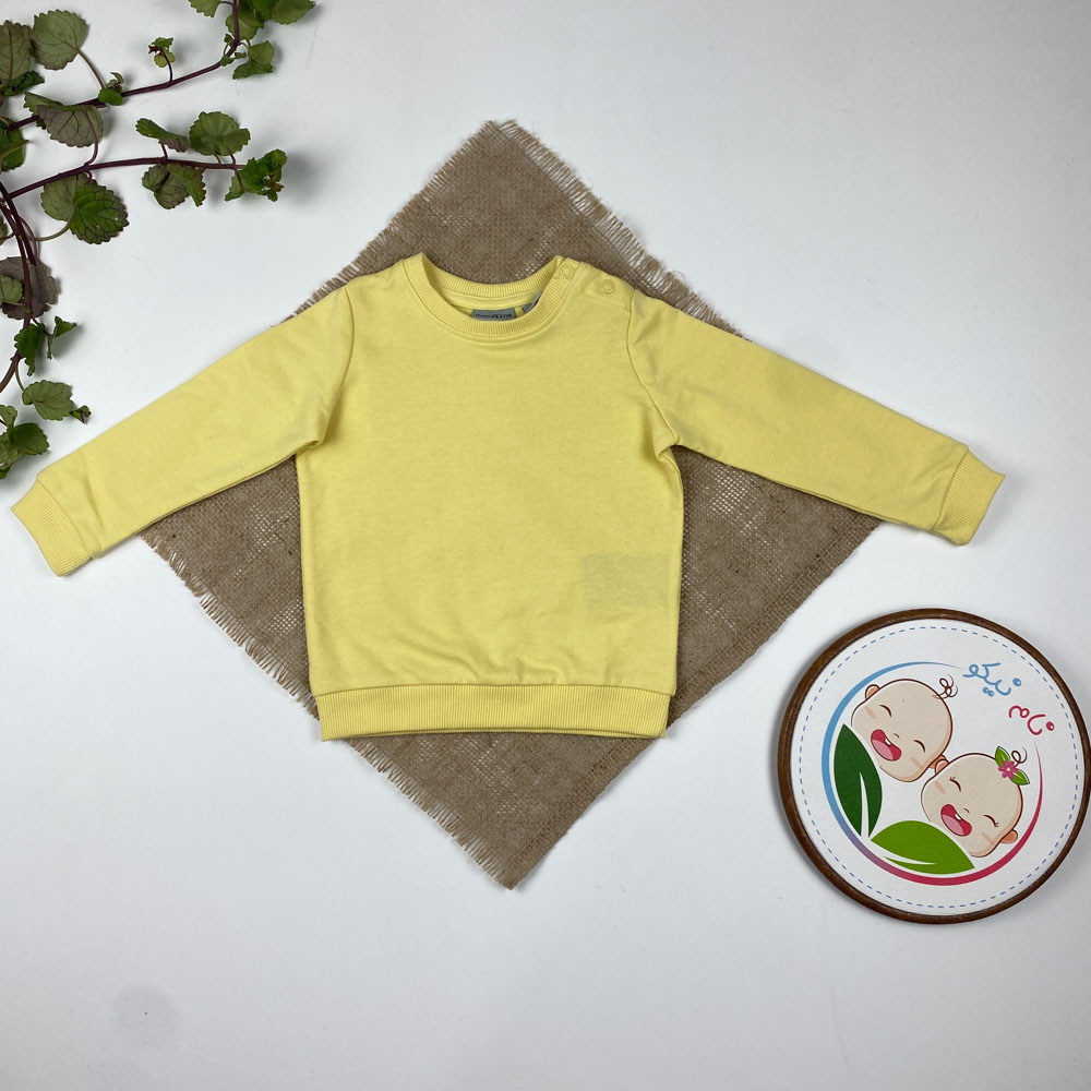 بلوز نوزادی آستین بلند برند لوپیلو طرح ساده یقه گرد دو دکمه ای لیمویی رنگ - 6 تا 12 ماه