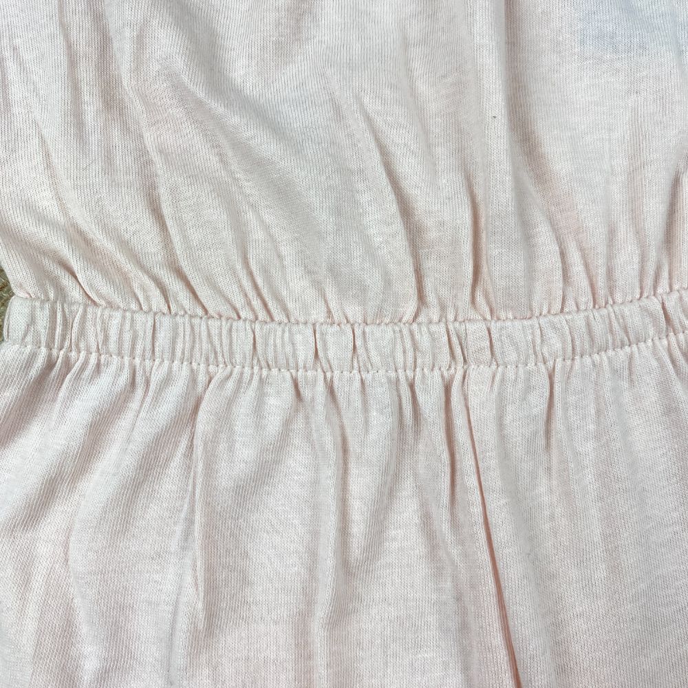 رامپر نوزادی دخترانه آستین حلقه ای برند لوپیلو طرح گل استین پرپری صورتی کمرنگ