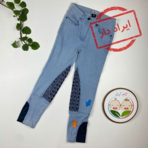 ایراد دار _ شلوار دخترانه طرح دو رنگ کمر دکمه ای آبی رنگ - 9 سال