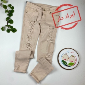 ایراد دار _ شلوار دخترانه طرح زاپ دار کمر دکمه ای کرمی رنگ - 12 تا 14 سال