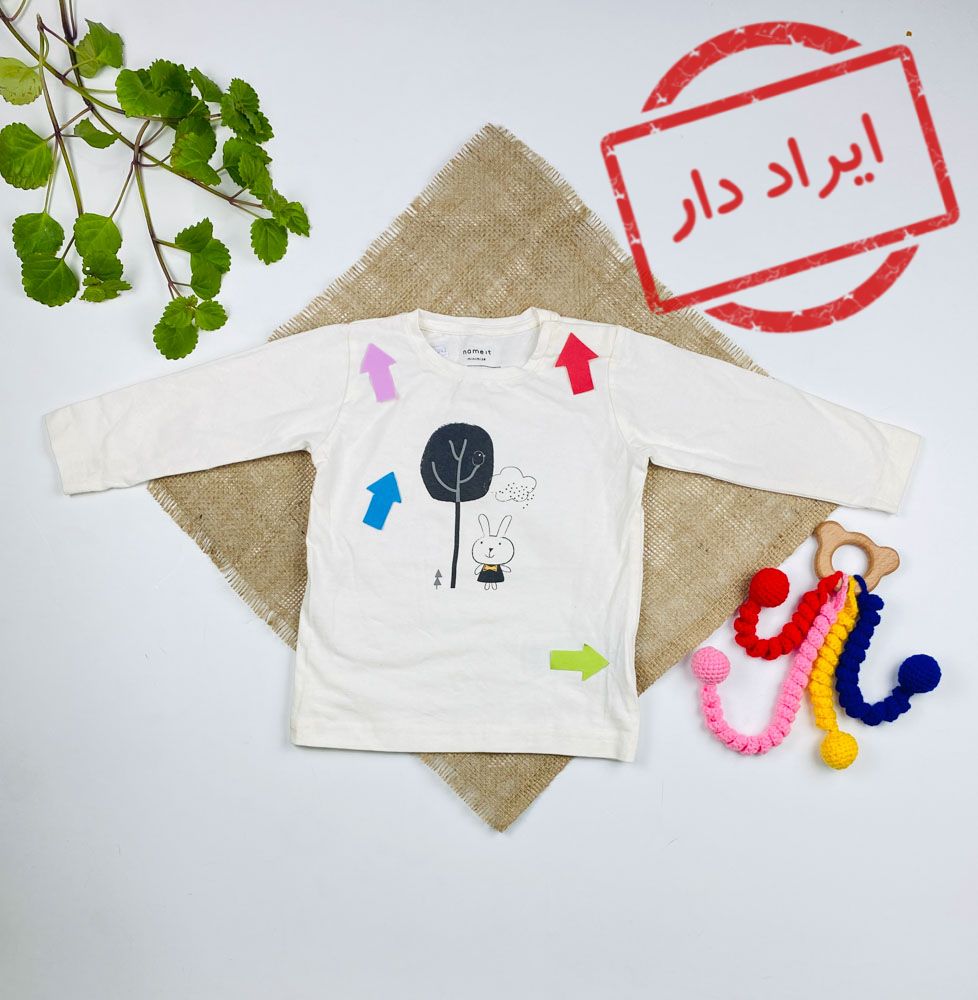 ایراد دار _ بلوز نوزادی آستین بلند طرح خرگوش و درخت یقه گرد بغل یقه دو‌دکمه ای شیری رنگ - 6 تا 9 ماه
