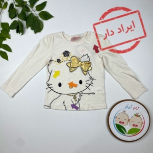 ایراد دار _ بلوز دخترانه آستین بلند طرح کیتی یقه گرد نباتی رنگ - 6 سال